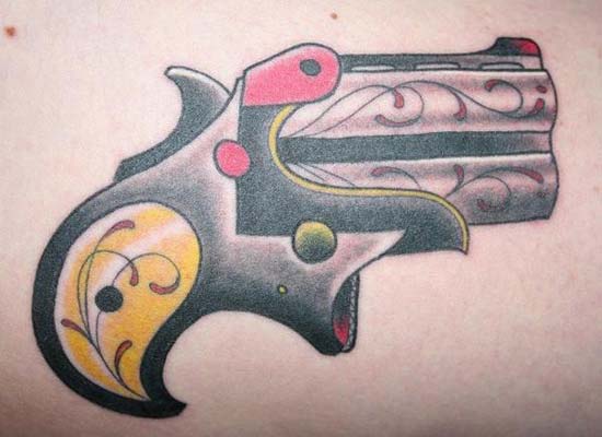 Pistol tattoo by Josh Ford