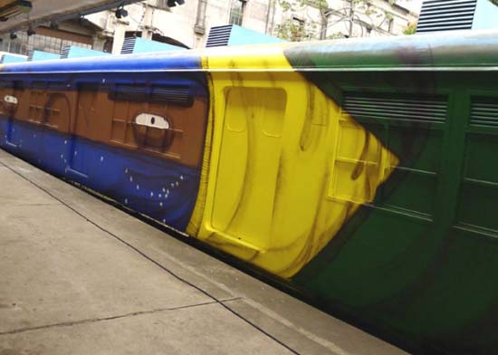Whole car train graffiti by the Brazilian duo Os Gemeos